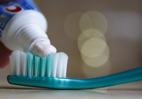 The effect of brushing with nano calcium carbonate and calcium carbonate toothpaste on the surface roughness of nano-ionomer